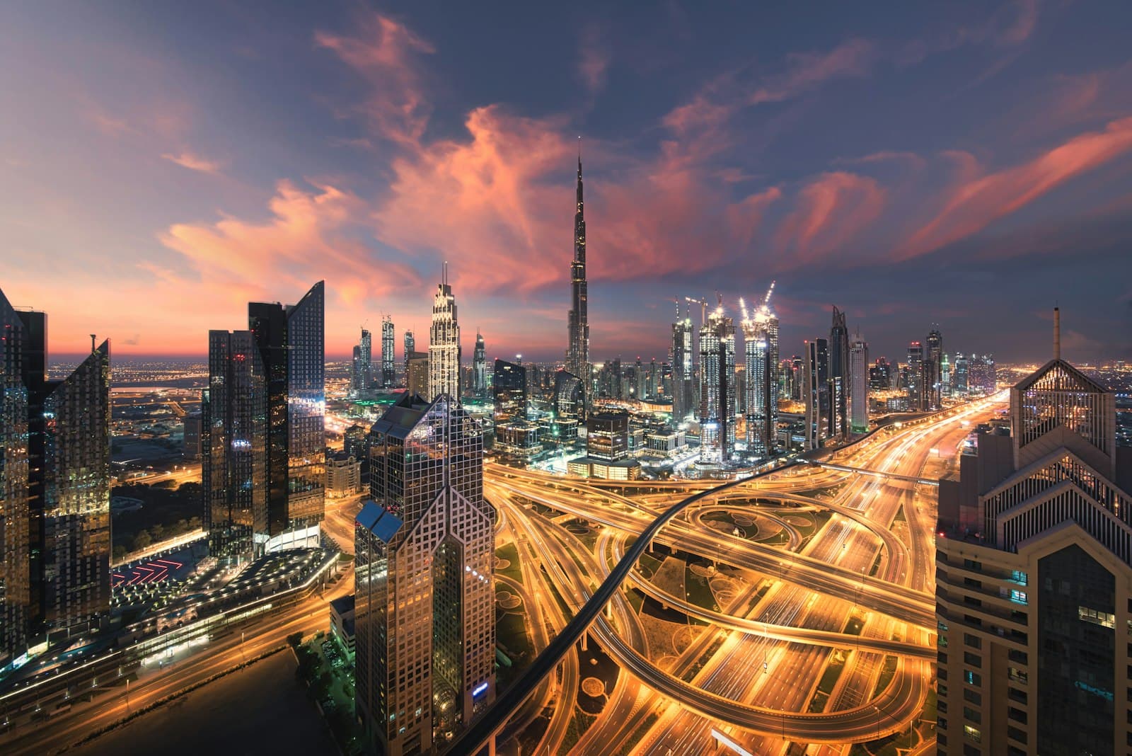 Dubai skyline at night with light trails on Sheikh Zayed Road