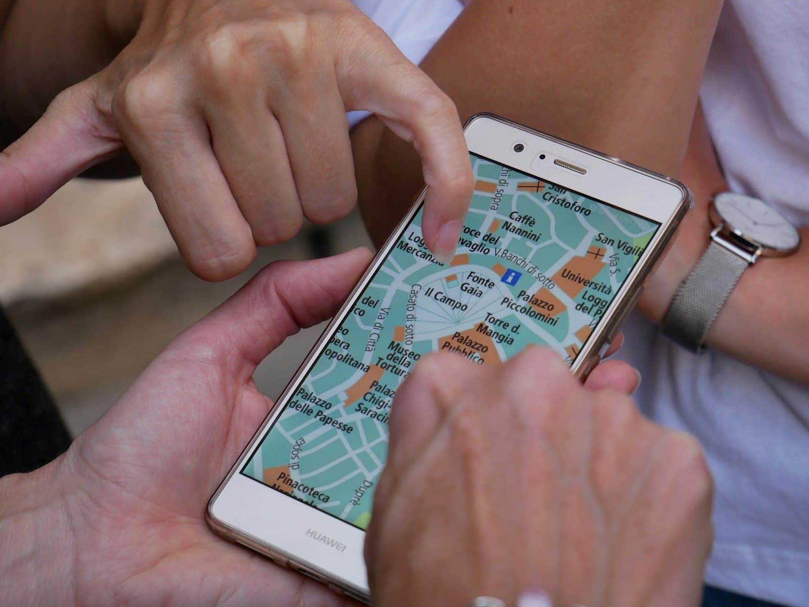 Person touching smartphone